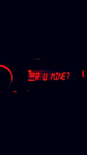 紅色發光文字在黑色背景上問「Are U Mine?」。 — 黑與紅 壁紙