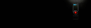 昏暗房間中的紅色監視器 — 機器人 壁紙