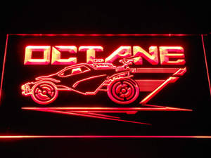 帶有 OCTANE 文字和賽車輪廓的紅色霓虹燈牌。 — 火箭聯盟 壁紙