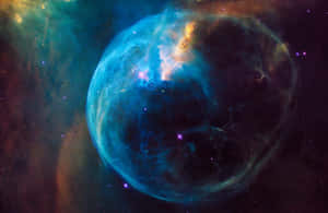 深空中帶有星星的鮮豔藍橙色星雲。 — 星際效應 壁紙