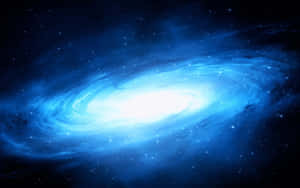 一個在深空中充滿星星的發光藍色螺旋星系。 — 藍色銀河 壁紙