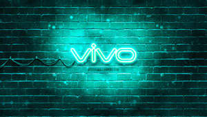 霓虹燈 vivo 標誌在雨夜中於濕磚牆上發光。 — 霓虹燈 壁紙