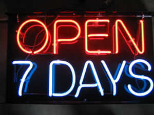 霓虹燈牌發出紅藍光芒，寫著「OPEN 7 DAYS」 — 霓虹 壁紙