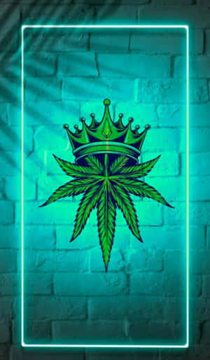磚牆上戴著皇冠的霓虹綠色大麻葉 — Tecno Megapad Pro 壁紙