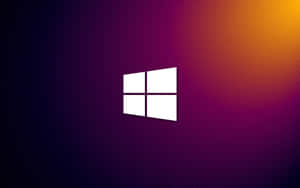 Windows標誌在漸變紫色橙色背景上帶有同心線條 — 黑色 Windows 10 壁紙