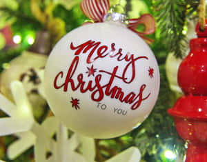 白色聖誕裝飾，紅色文字寫著 Merry Christmas to You。 — 聖誕球 壁紙