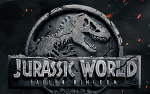 Jurassic World Fallen Kingdom 標誌，帶有破裂石頭和飛濺火花。 — 侏羅紀公園 壁紙