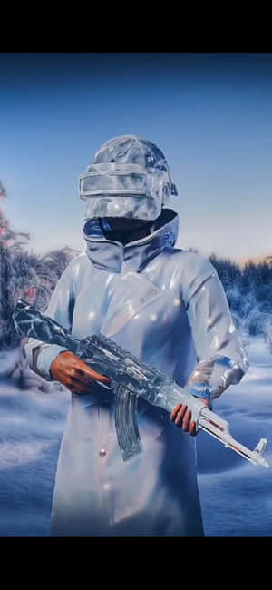 穿著冰甲的人，在雪地荒野的黃昏中手持一把冰凍步槍。 — Realme Note 壁紙