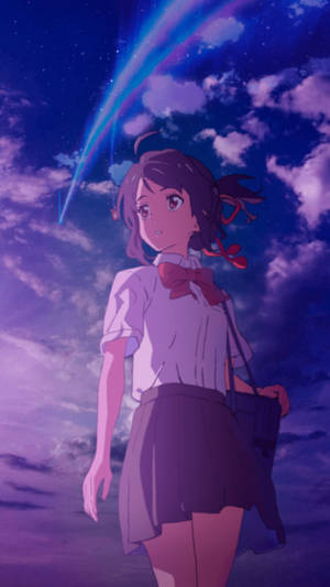 穿著校服的動漫女孩在繁星點點的夜空中觀看一顆發光的彗星。 — 你的名字 GIF 壁紙
