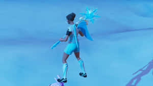 穿著藍色冬季裝備的Fortnite角色在雪地上手持冰杖行走。 — Studio Display 壁紙