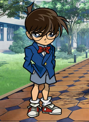 動漫男孩穿著校服站在戶外磁磚小徑上 — 名偵探柯南 壁紙