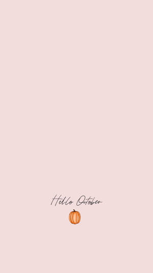 蜜桃色背景上帶有 Hello October 文字和一個小南瓜。 — 可愛粉色動圖 壁紙