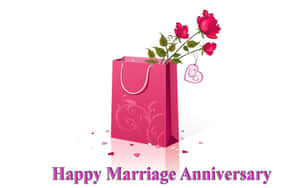 粉紅色禮物袋，配有紅玫瑰和心形標籤，適合結婚紀念日。 — 玫瑰花 壁紙