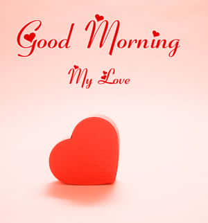 粉紅色背景上帶有「Good Morning My Love」文字的紅色心形。 — 榮耀Magic V 壁紙