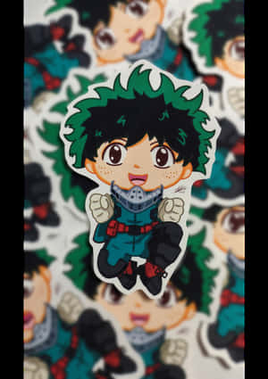 綠色頭髮和藍色服的chibi動漫英雄貼紙，握緊拳頭 — Realme Pad 3 壁紙