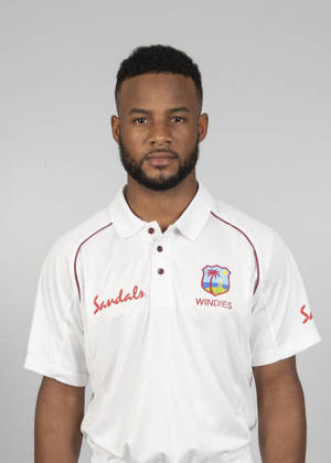 一個穿著Windies板球隊Polo衫的男人的肖像。 — 板球 壁紙