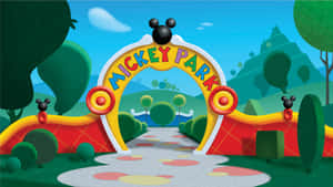 Mickey Park 入口，在卡通景觀中有色彩繽紛的拱門和圓點小徑。 — 米奇妙妙屋 壁紙