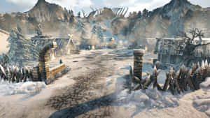 山區冬季景觀中積雪的中世紀村莊大門。 — 暮光 壁紙