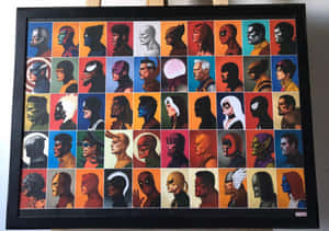 裝裱藝術品，以大膽色彩展示Marvel超級英雄輪廓的網格。 — 漫威復仇者聯盟 壁紙