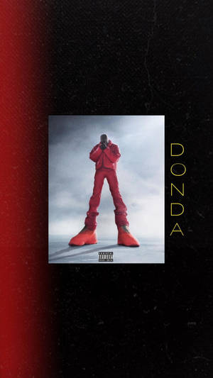 DONDA 專輯封面，一個穿紅衣的男人站在灰色平台上。 — 肯伊·威斯特 壁紙