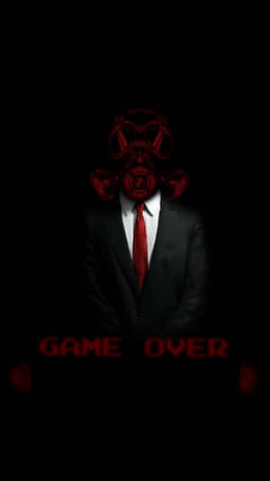 一個穿西裝的人戴著紅色防毒面具，並有紅色的「GAME OVER」文字。 — 暗黑地牢 壁紙