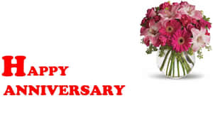 Happy Anniversary 賀卡，搭配玻璃花瓶中的粉紅色花朵。 — 慶祝 壁紙