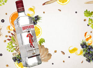 Beefeater琴酒瓶被柑橘和香草環繞。 — 柳橙 壁紙