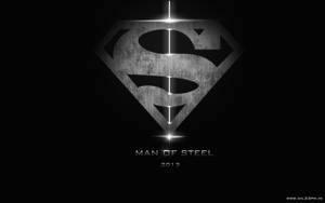 金屬超人標誌，帶有發光線條和「Man of Steel 2013」文字，背景為深色。 — 猩猩 iPhone 壁紙