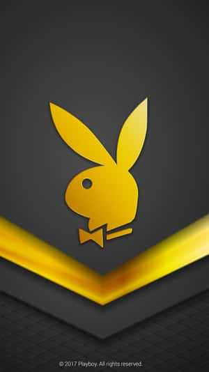 深灰色背景上的金色Playboy兔子標誌，帶有黃色V形亮點。 — 漫威標誌 壁紙