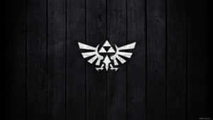 深色木板背景上的銀色三角力量標誌 — 薩爾達傳說 � Breath of the Wild 壁紙