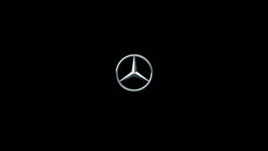 黑色背景上的賓士標誌 — Mercedes Benz C300 壁紙