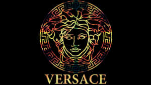 Versace 標誌，在黑色背景上以漸變色呈現發光的美杜莎頭像。 — 凡賽斯 壁紙