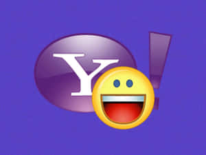 紫色背景上，Yahoo標誌搭配一個笑臉表情符號。 — 雅虎 壁紙