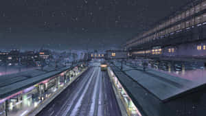 雪在星空下的夜晚落在火車站上。 — 新海誠 壁紙