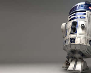 灰色背景的簡約工作室中的R2-D2機器人 — 4K 星際大戰 壁紙