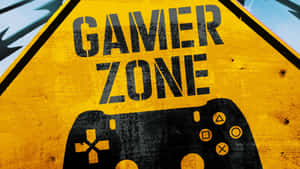 黃色三角形標誌，黑色文字寫著「GAMER ZONE」，並附有遊戲控制器圖案。 — 高畫質遊戲 壁紙