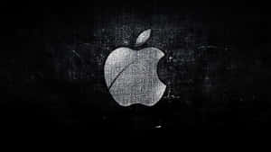 銀色點狀工藝的Apple標誌，位於帶刮痕的黑色背景上。 — 4K Apple 壁紙