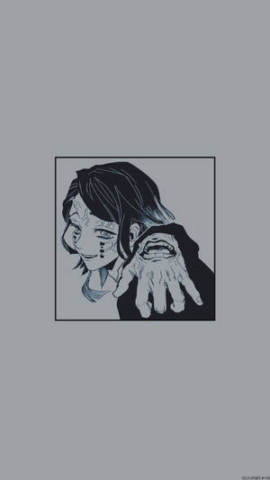 深色頭髮和標記的動漫角色握著一隻扭曲的手。 — 鬼滅之刃 壁紙