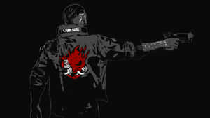 武士背對鏡頭，外套上有火焰骷髏補丁，正在瞄準手槍。 — 賽博龐克城市 壁紙