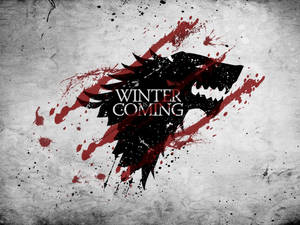冰原狼標誌，帶有紅色飛濺和 winter is coming 文字，位於紋理灰色背景上。 — 血源詛咒 壁紙