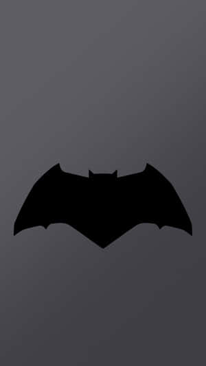 漸變灰色背景上的黑色蝙蝠標誌 — DC漫畫 壁紙