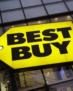 玻璃建築外牆上的Best Buy商店標誌 — 最佳購買 壁紙