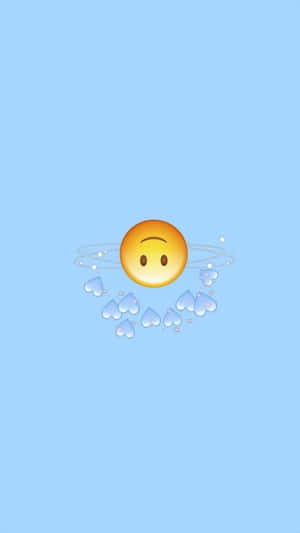 悲傷表情符號帶有軌道和漂浮的心形，背景為淺藍色 — 低對比 壁紙