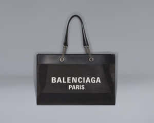 黑色Balenciaga Paris手提袋，正面網眼設計，鏈條手柄。 — 巴黎世家 壁紙