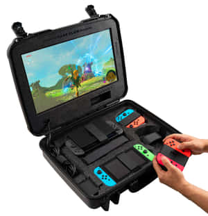 手拿著紅色Nintendo Switch控制器，旁邊是打開的保護殼，內有主機及其他控制器。 — Pixel 10 Pro Fold 壁紙