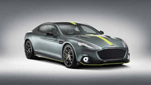 灰色 Aston Martin 跑車，在工作室燈光下帶有黃色點綴。 — 奧斯頓馬丁 壁紙