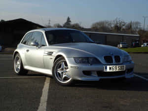 銀色BMW Z3 M Coupe停放在停車場，夕陽西下。 — Mercedes Benz C300 壁紙