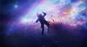 太空人帶著浮石在色彩繽紛的宇宙星雲中漂流。 — 藍色美學電腦 壁紙