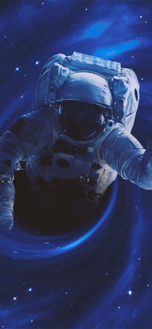 太空人在充滿星星的藍色星雲中漂流 — Galaxy A55 壁紙
