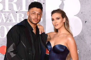 名人情侶在BRIT Awards紅地毯活動中擺姿勢。 — 運動 壁紙